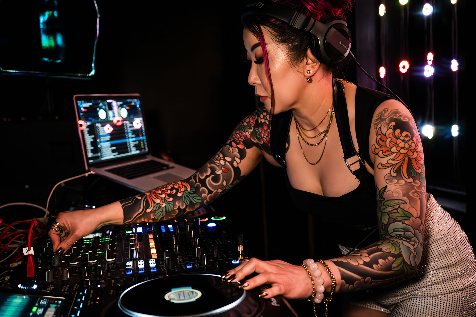 DJ Miyuki performing behind the decks
