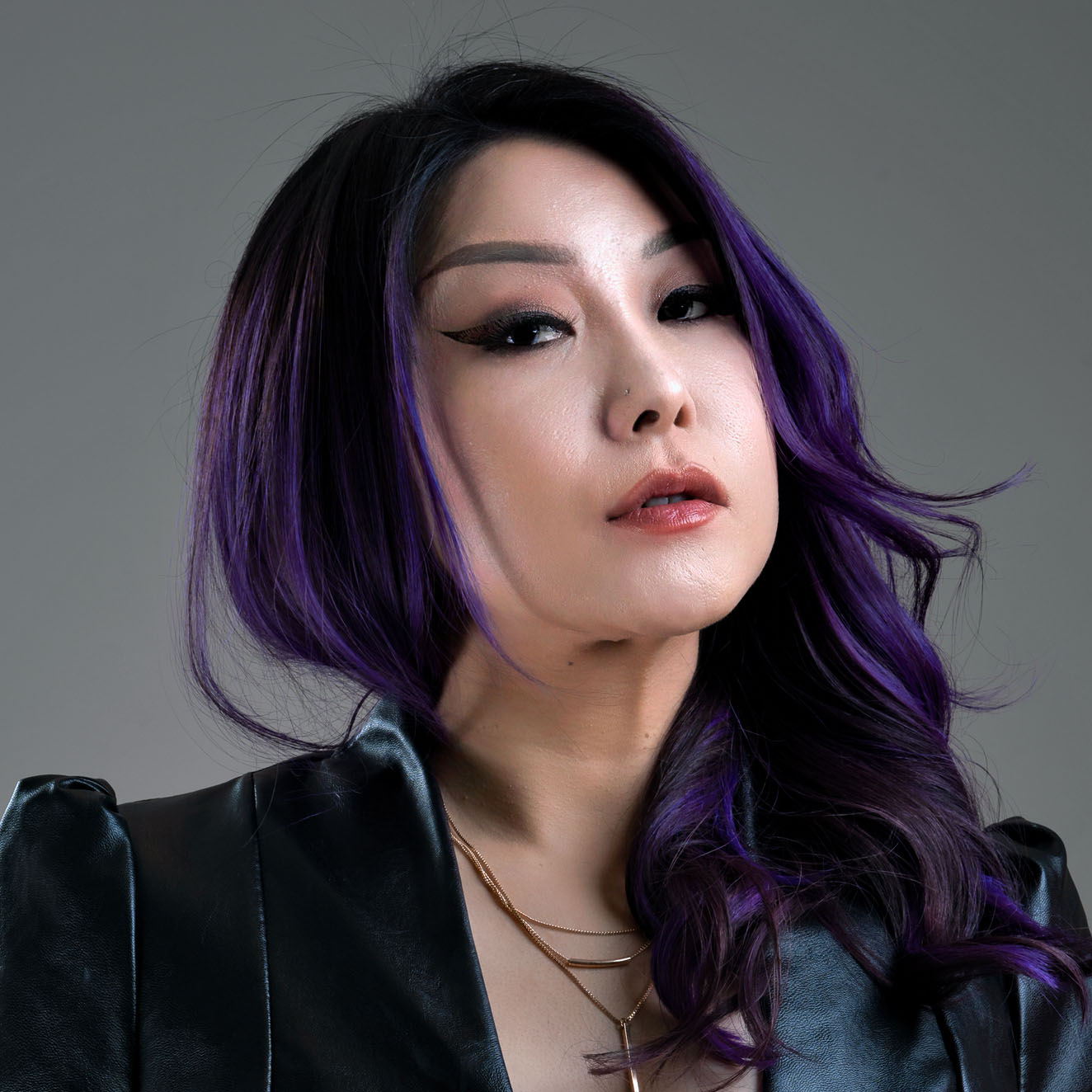 Studio headshot of DJ Miyuki